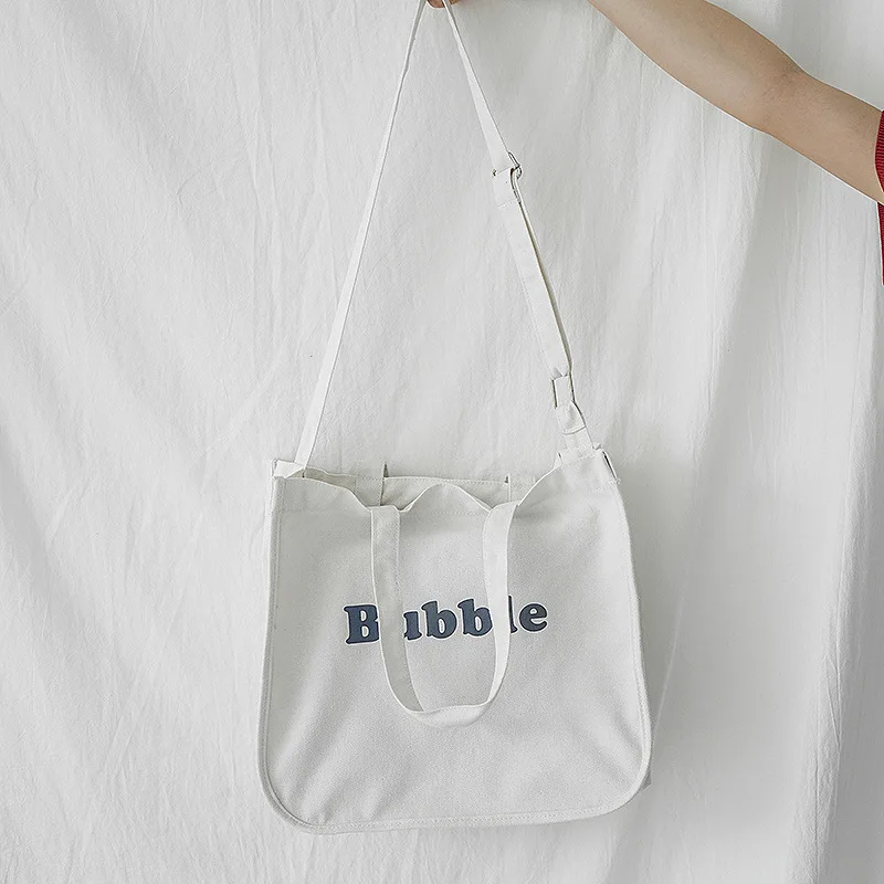 

Women Canvas Handbags Ladies Letter Cartoon Printing shoulder bags Simple Versatile Student Shopping Bag Ladies Messenger Bags
