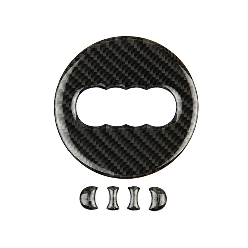 Реальные углеродного волокна рулевого колеса автомобиля с логотипом в центре