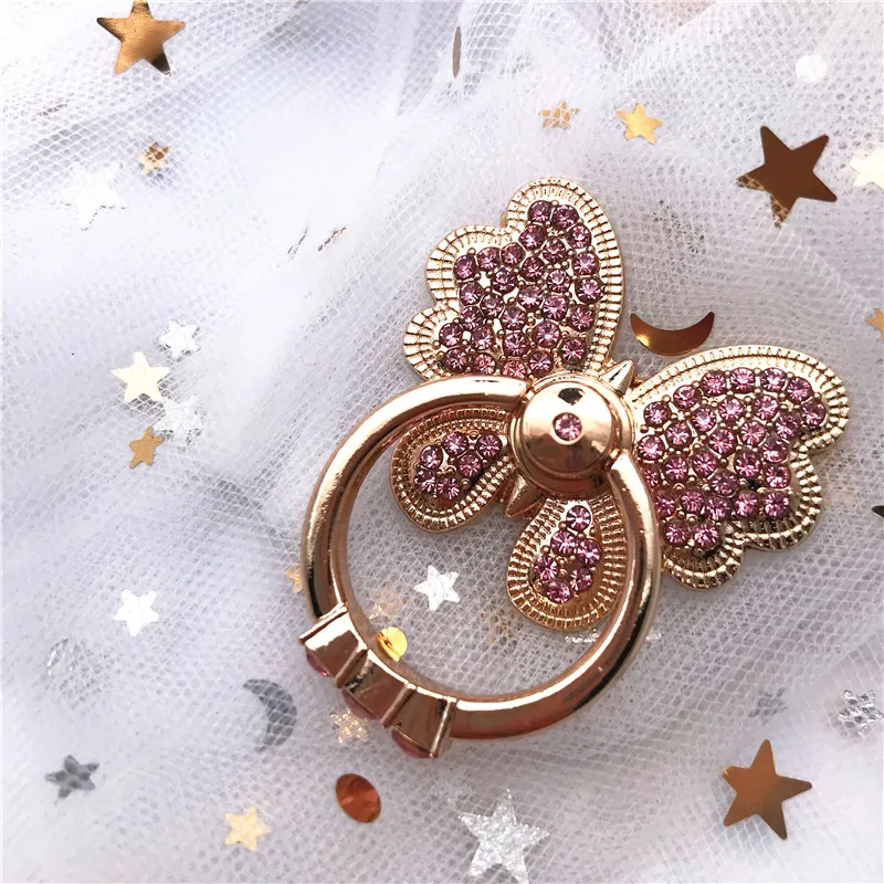 Металлическое кольцо-держатель для смартфона с розовым бантом и бабочкой |