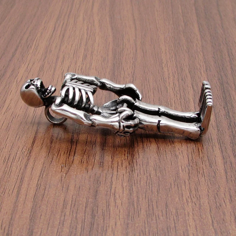 

Free Shipping Punk 316L Stainless Steel Silver Color Black Angry Skull Man Pendant Jewelry Of Skeleton Bones Gift