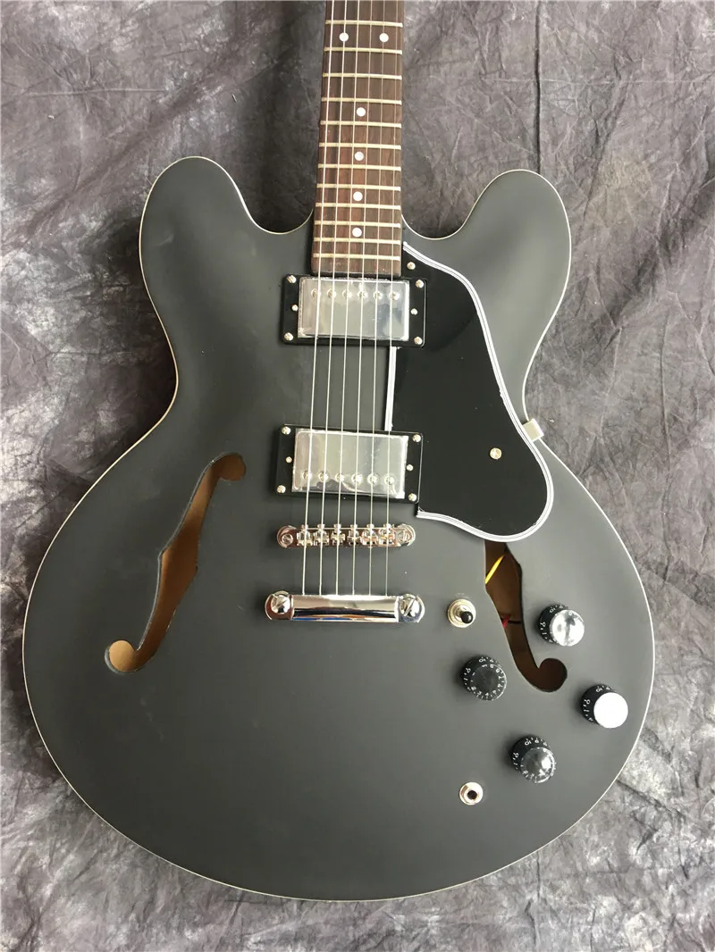 

Black matt custom hollow F empty jazz guitar 335 electric guitar new wholesale. Good sound quality, new style,