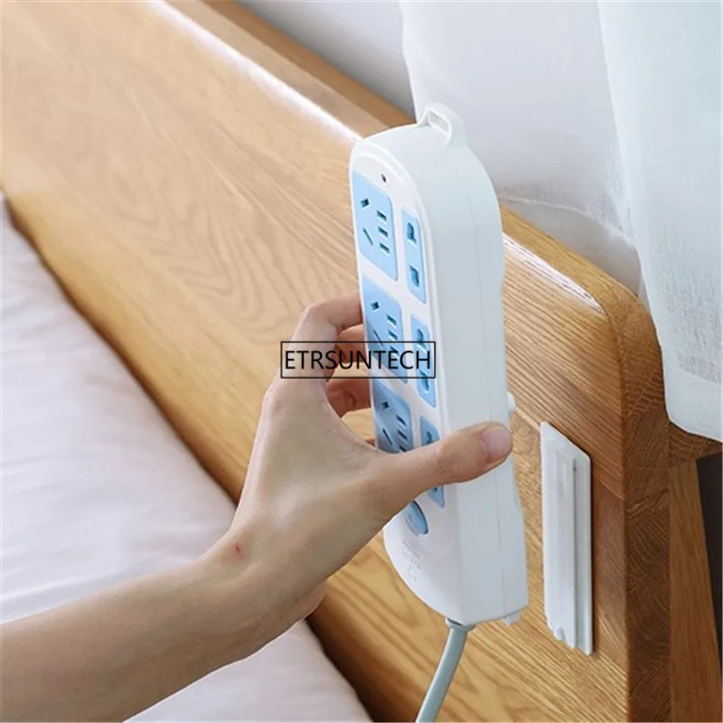 

100pcs Power Plug Socket Holder Shelf Power Plug Storage Rack Self Adhesive Wall Mounted Power Socket Plug Board Router Holder