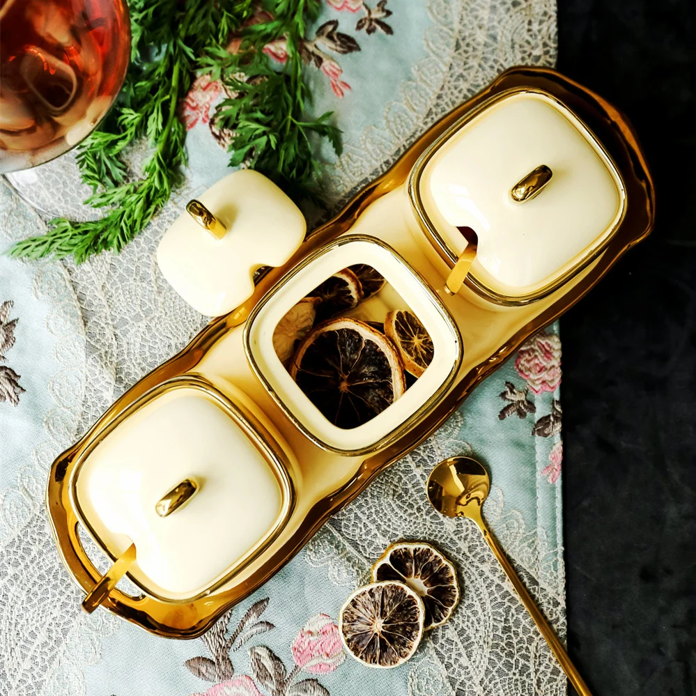 

Exquisite golden kitchen ceramic seasoning jar Royal style fashion spices salt storage bottle