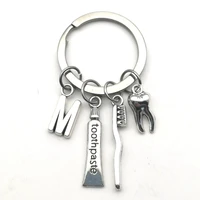 2021 creative key ring teeth toothbrush toothpaste alphabet keychain appeal to care for the dental doctor nurse family jewelry