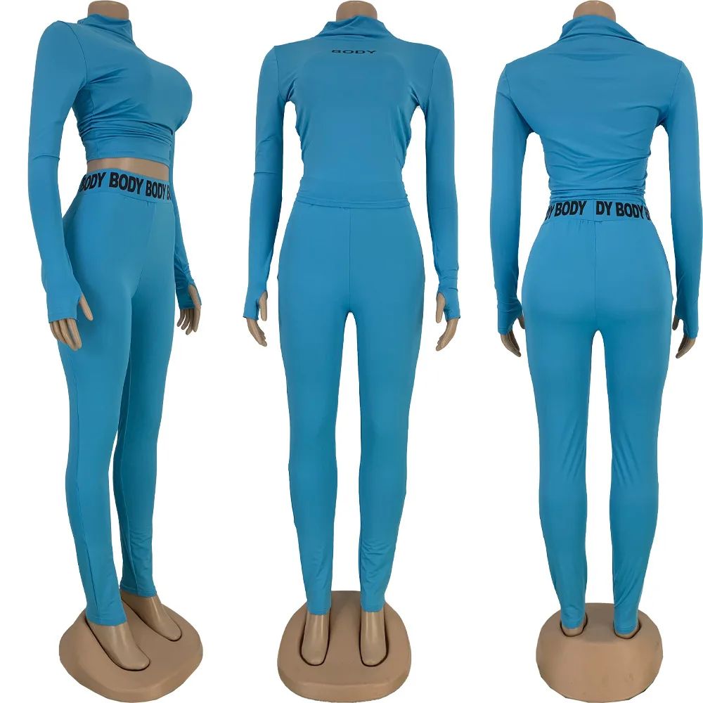 

European fashion solid color letter print tight sports suit casual o-neck long sleeve shirt and trousers women's two-piece set
