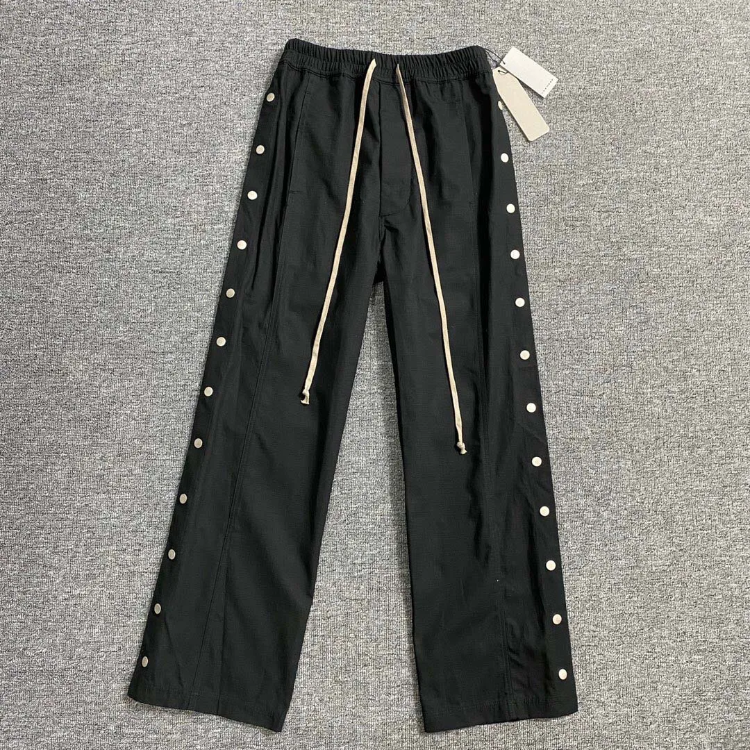 Мужские черные брюки с широкими штанинами и боковой застежкой | Мужская одежда