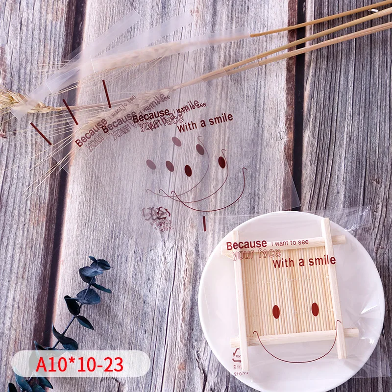 100 шт./лот прозрачная Милая Линия лица с маленьким целлофановым пакетиком