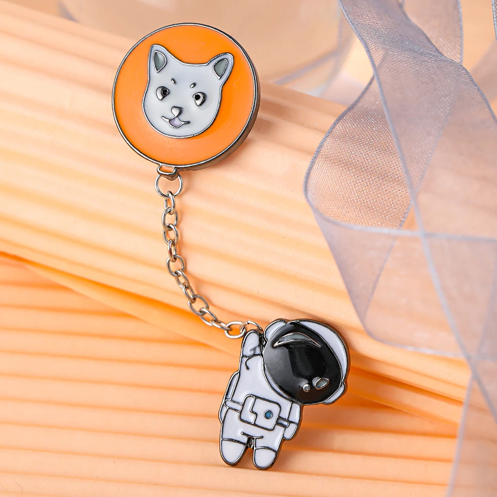 

Cartoon cosmonauts drop oil brooch stylish simple space cat badge
