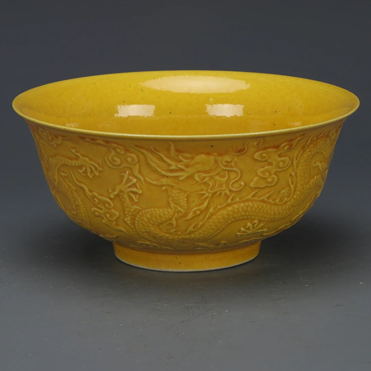 Изящная чаша с желтой глазурью и рисунком дракона изготовленная в стиле династии