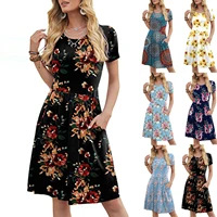 2021 new womens dress with round neck and short sleeve pocket printed in spring and summer