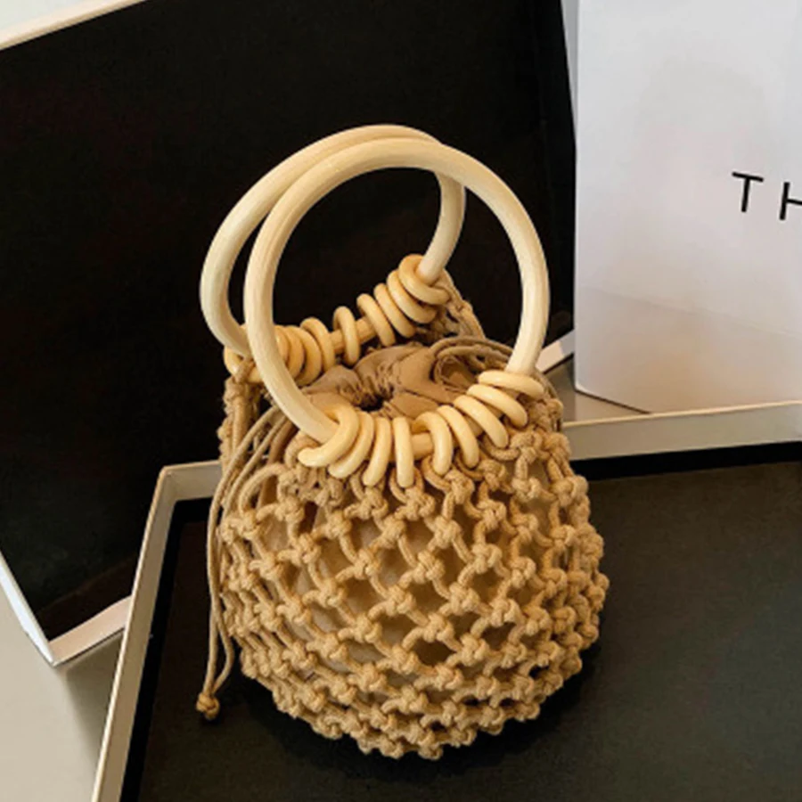 

Casual Hollow Out Weave Straw Bag Women Handbag Designer Round Handle Drawstring Bucket Bags for Women 2021 Beach Travel Bag INS