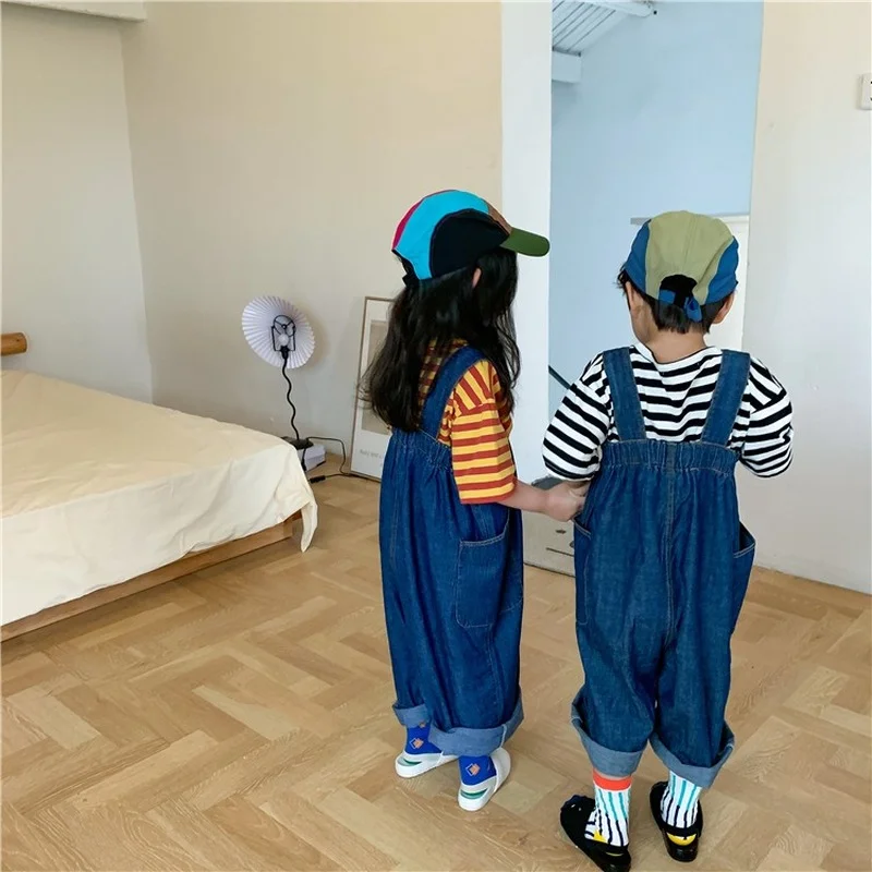 

2021 Baby Boys and Girls Solid Color Cowboy Causal Loose Suspender Pant Toddler Children Denim Pocket Sling Trousers