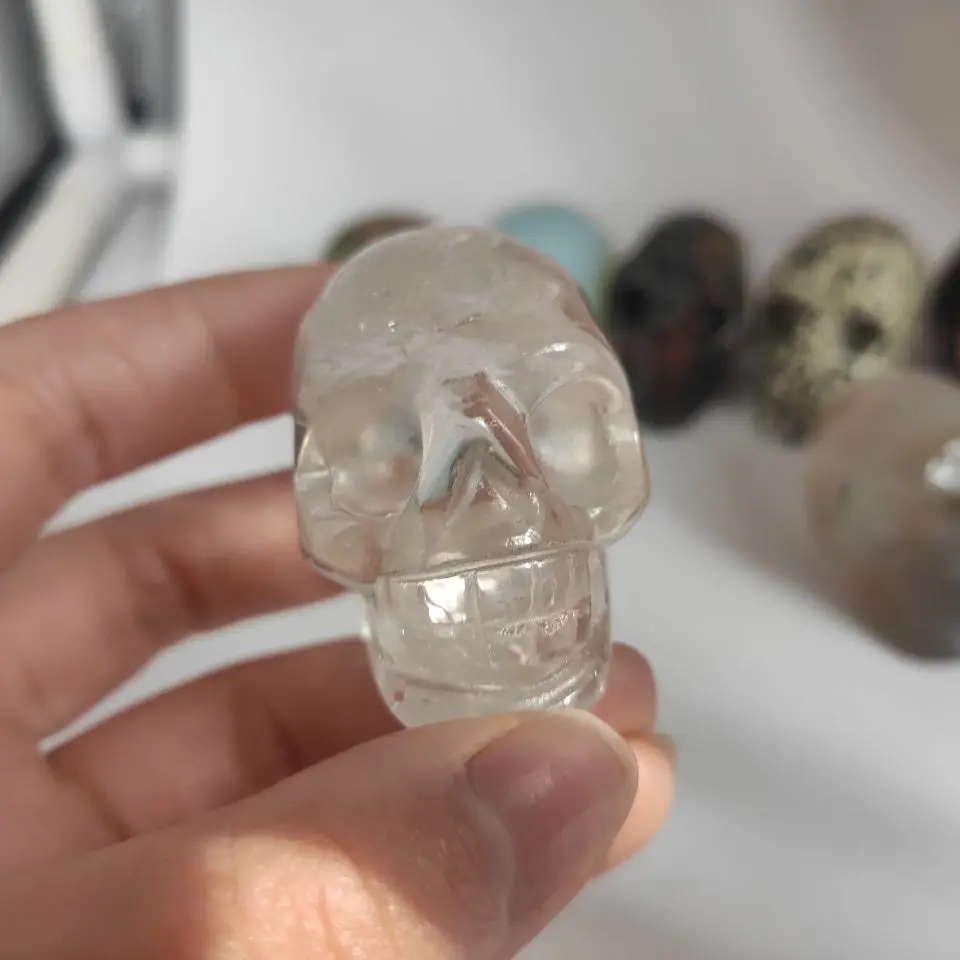 

2.0 natural crystal Ghost Head Carved Skull Healing Stone Home Decor Or Halloween Party Bar Decoration Gift