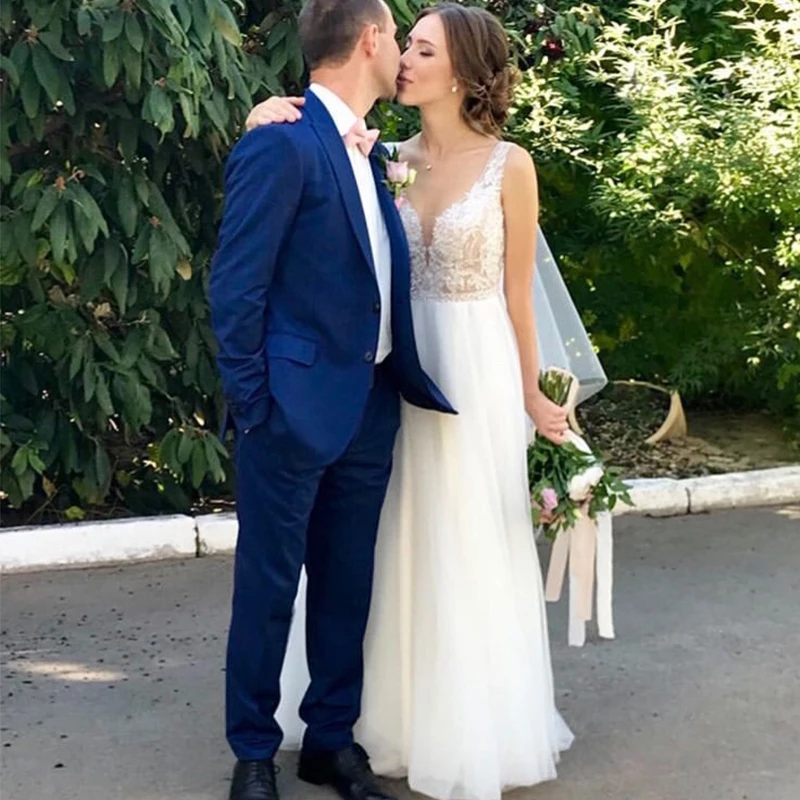 

Romantic Bohemian A Line Wedding Dress V Neck Appliques Beading Summer Tulle Wedding Dresses Sexy Backless Bridal Gowns