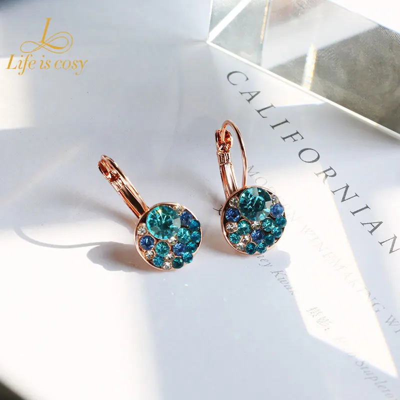 

Creative elf ball red and white ladies earrings European and American fashion engagement earrings