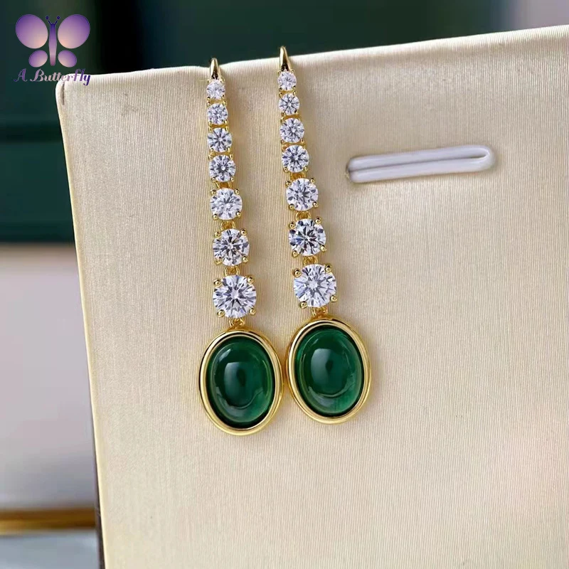 

Серьги из серебра 925 пробы с 18-каратным золотом и изумрудом