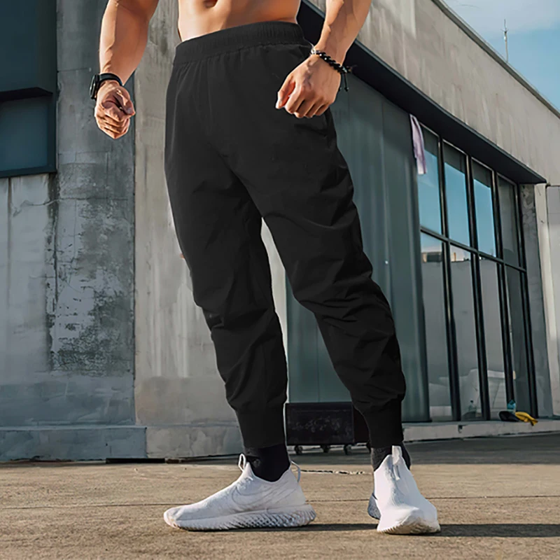 

New Brand Mens New Joggers Casual Pants Fitness Men Sportswear Fashion Skinny Sweatpants Trousers Black Gyms Jogger Track Pants