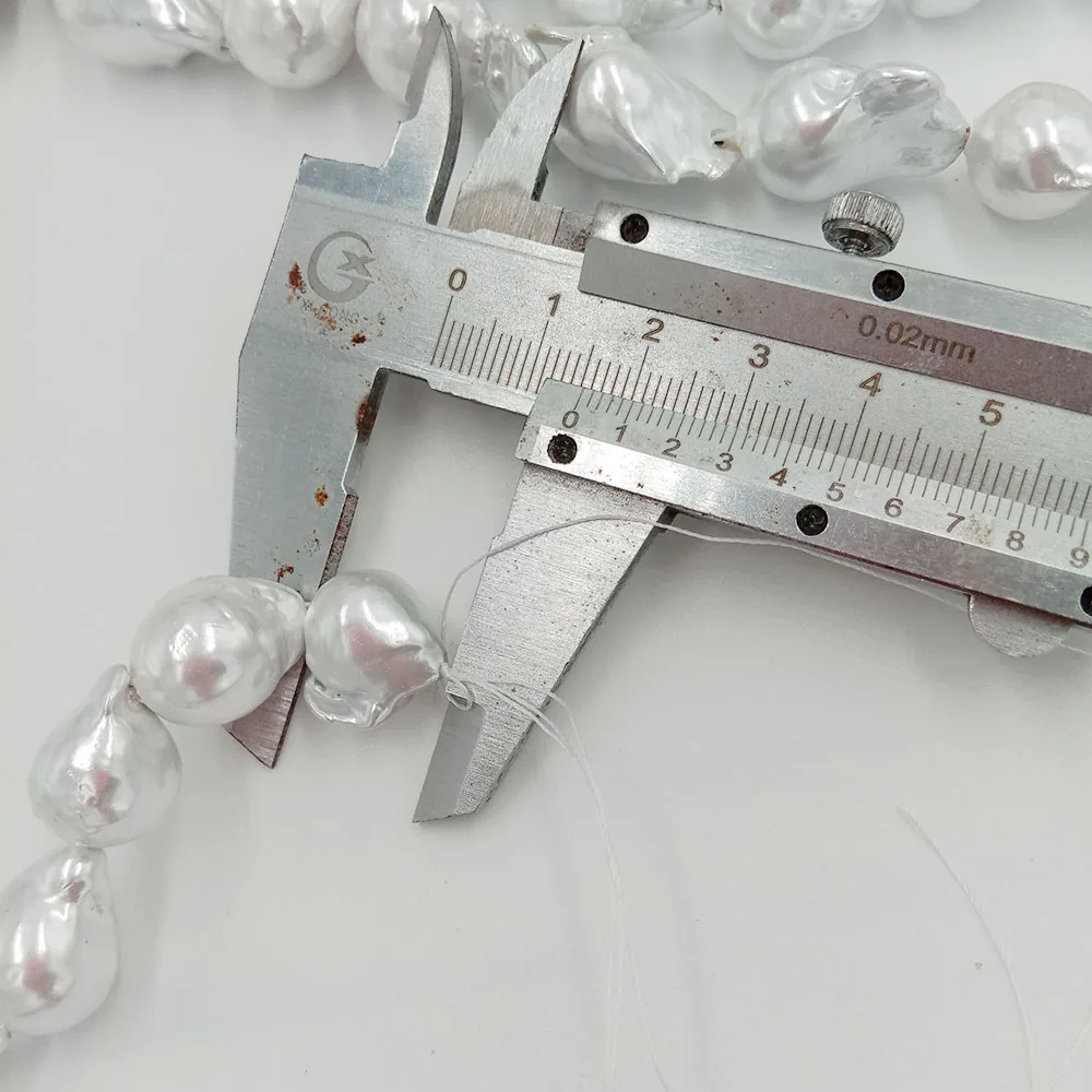 Пресноводные жемчужины в форме барокко большие 11-13 мм x 14-18 100% пресноводные. Цвет с