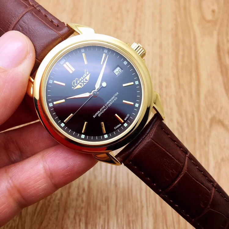 

Hot sale in gold style, simple round hollow men's mechanical watch with solid steel band 2021 new casual fashion business