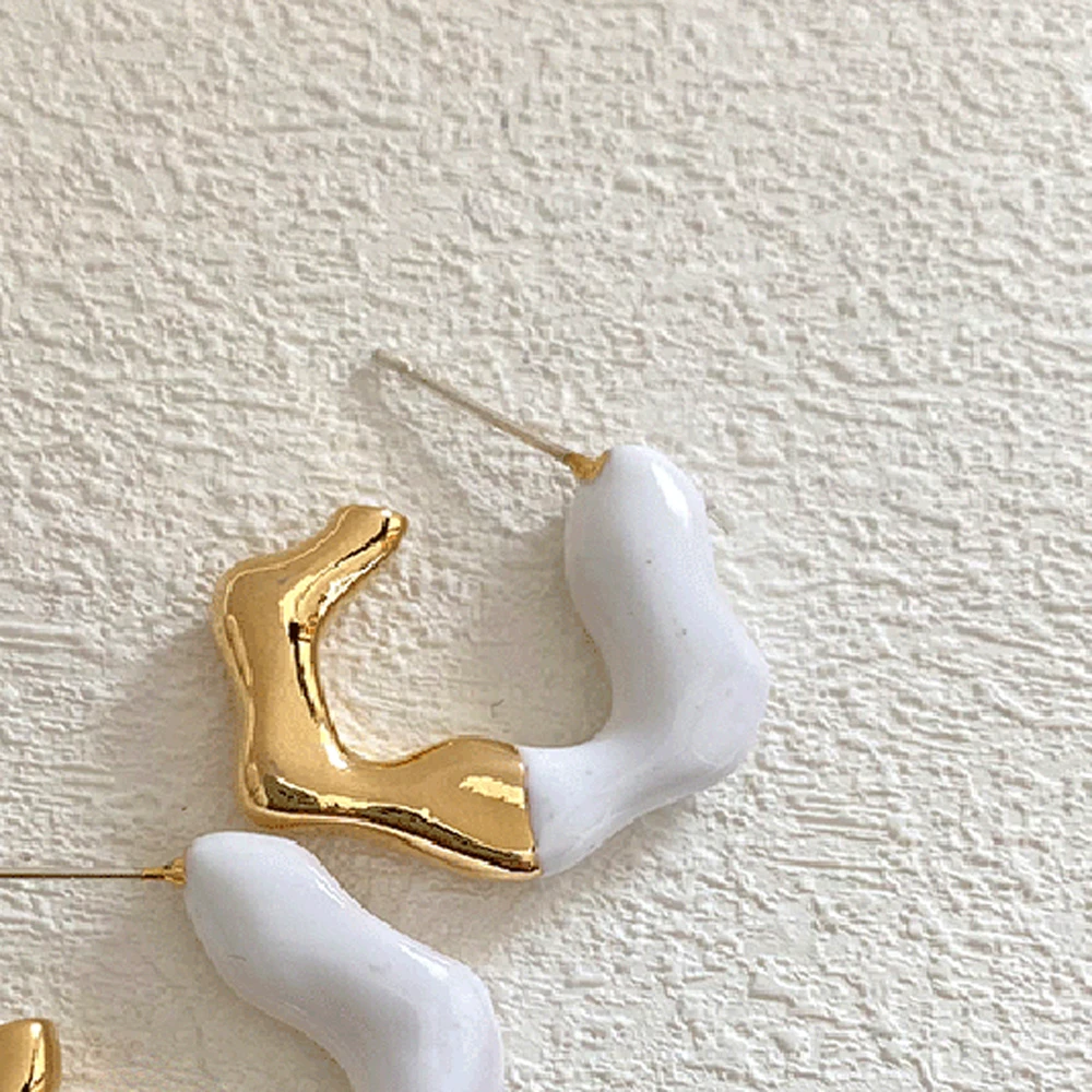 

Simple Geometric Women Earrings Temperament Hollow Out Geometric Bump Color Restoring Ancient Ways Fashion Earrings Gift