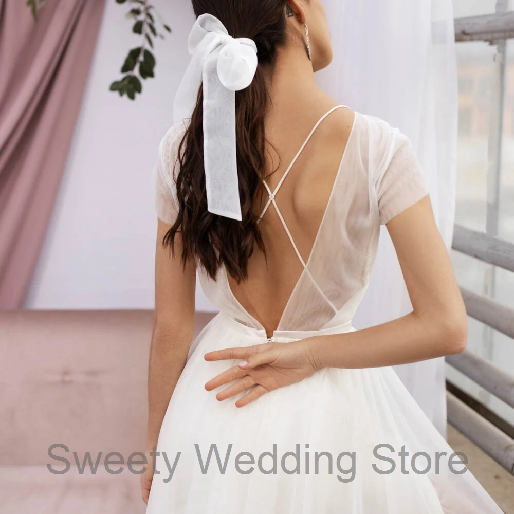 

Jiayigong Women's Wedding Dress Short Sleeve O Neck Beading Crystals Tulle A Line Backless Bridal Wedding Gowns for Bride