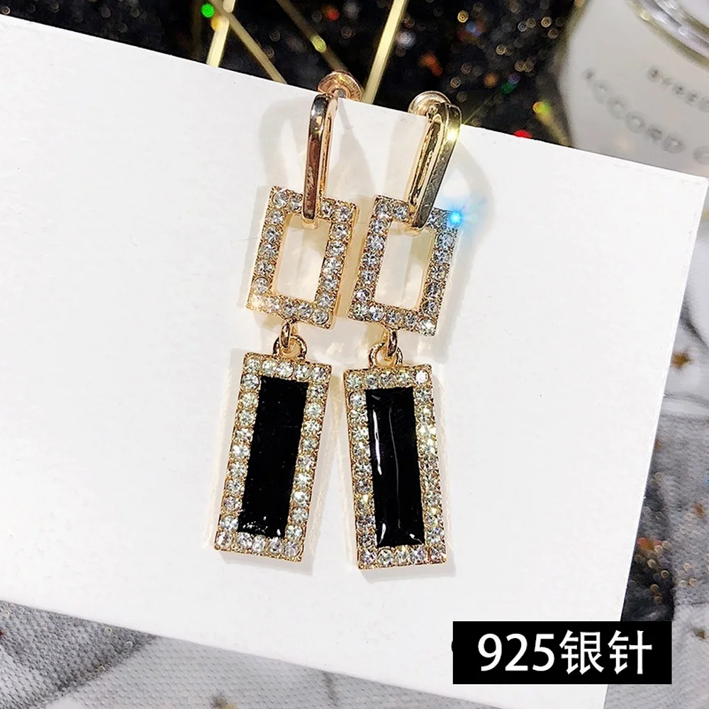 

new Japanese and Korean fashion ladies party alloy inlaid diamond long French pendant earrings design fashion trend earrings