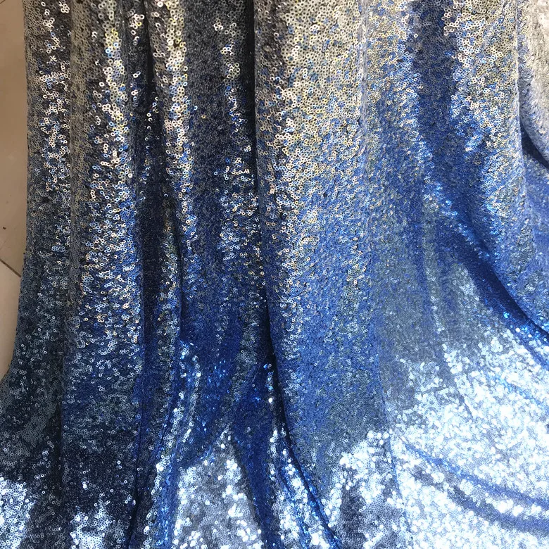 1 м/уп. светло голубая серебристая белая ткань с блестками градиентом для платья