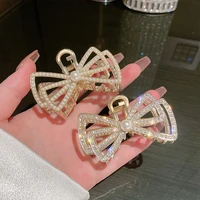 2021 new hyperbole big pearls hair claw clips big size makeup hair styling barrettes for women hair accessories rhinestone bow