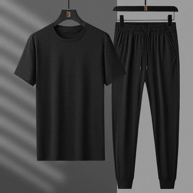 

Ice silk suit men's summer loose large casual sports pants mesh thin short sleeve trendy legged pants men's