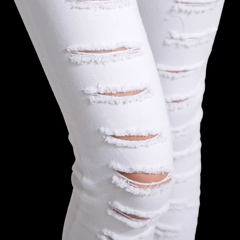 Женские джинсовые брюки с дырками черные и белые узкие карандаш для студентов