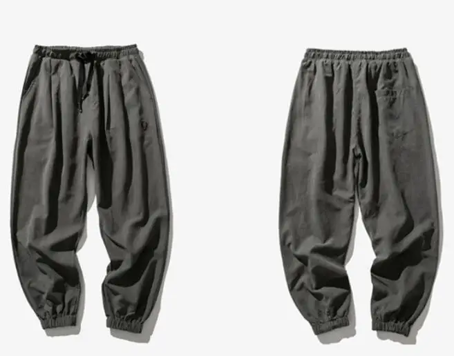 

New style Men's drawstring trousers loose gray color sport pants