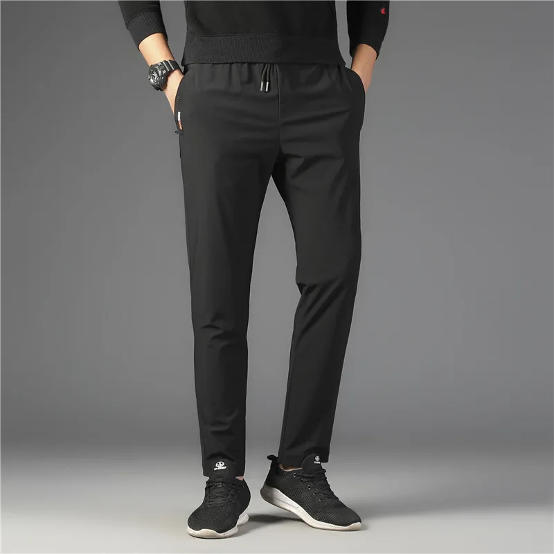 

Men's pants thin summer ice fast drying sports casual pants 2021 new men's loose straight large pants