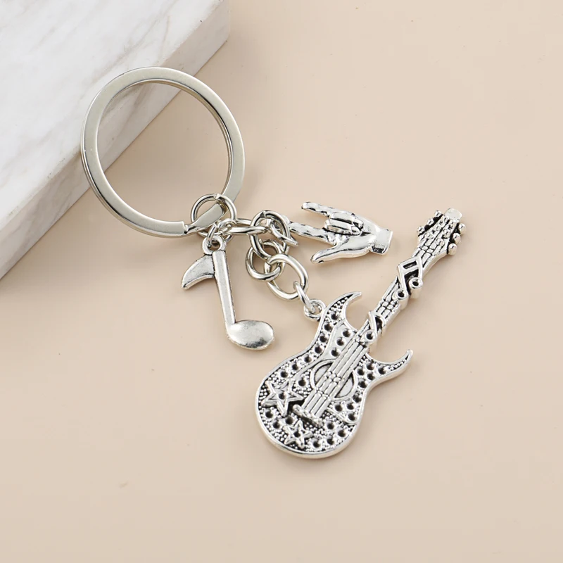 

Брелок для ключей с музыкальными нотами, гитарой, надписью «I Love You»