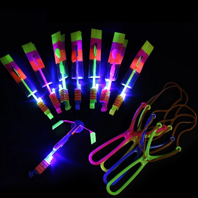 

Hot large 4pcs/set Led Lighting Up Luminous Toy Flying slingshot Flying Toys Toys Xmas Decor light Quickly fast catapult