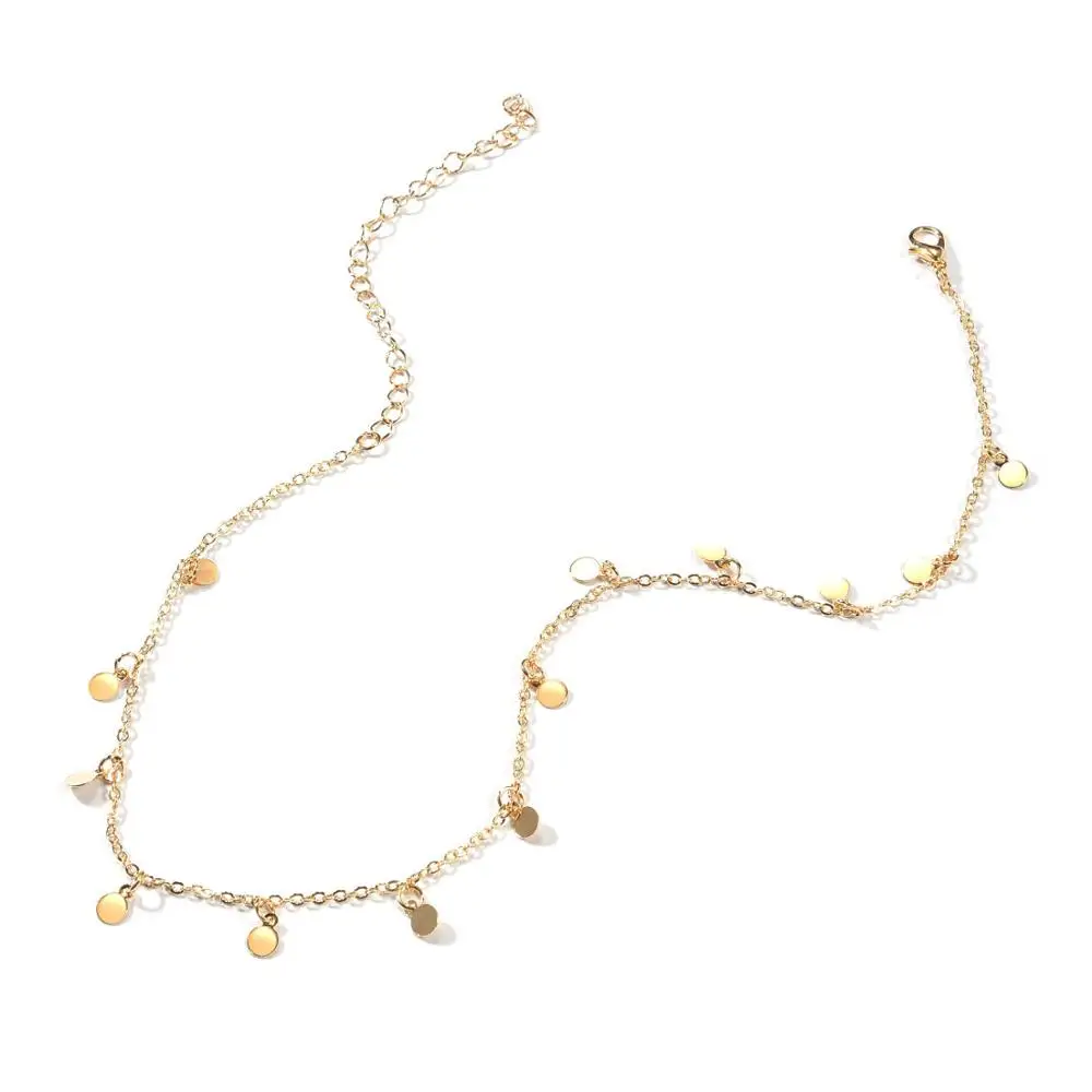 Женское колье чокер золотистого цвета с блестками монетами и кисточками