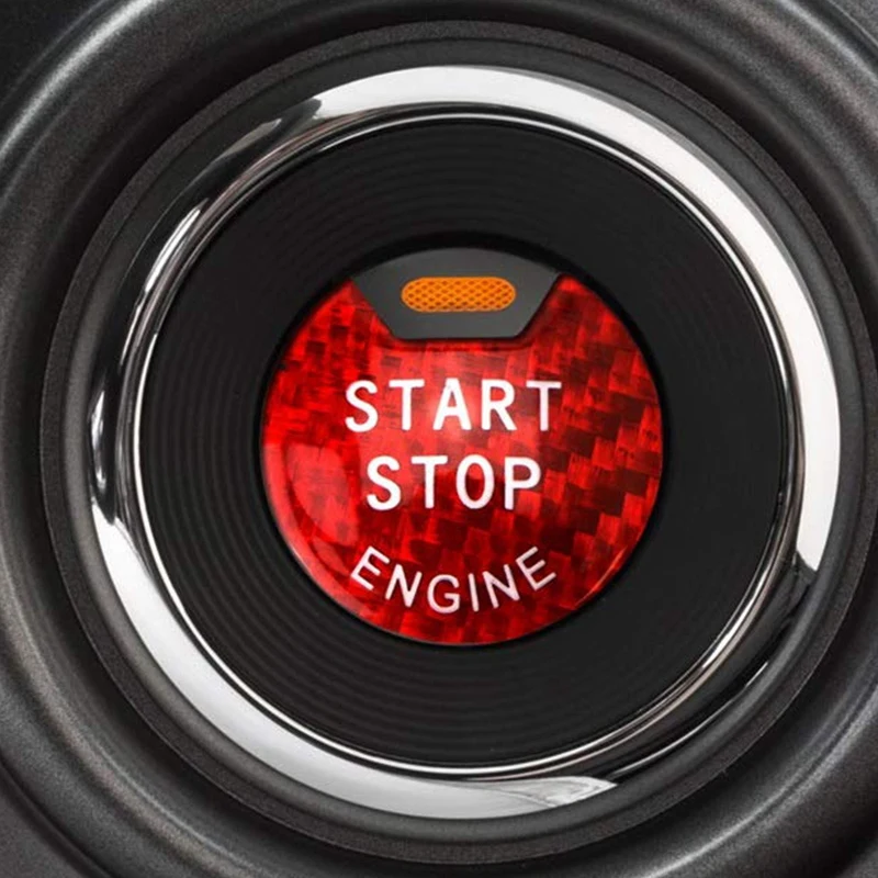 Блестящая красная нажимная кнопка запуска/остановки двигателя из настоящего