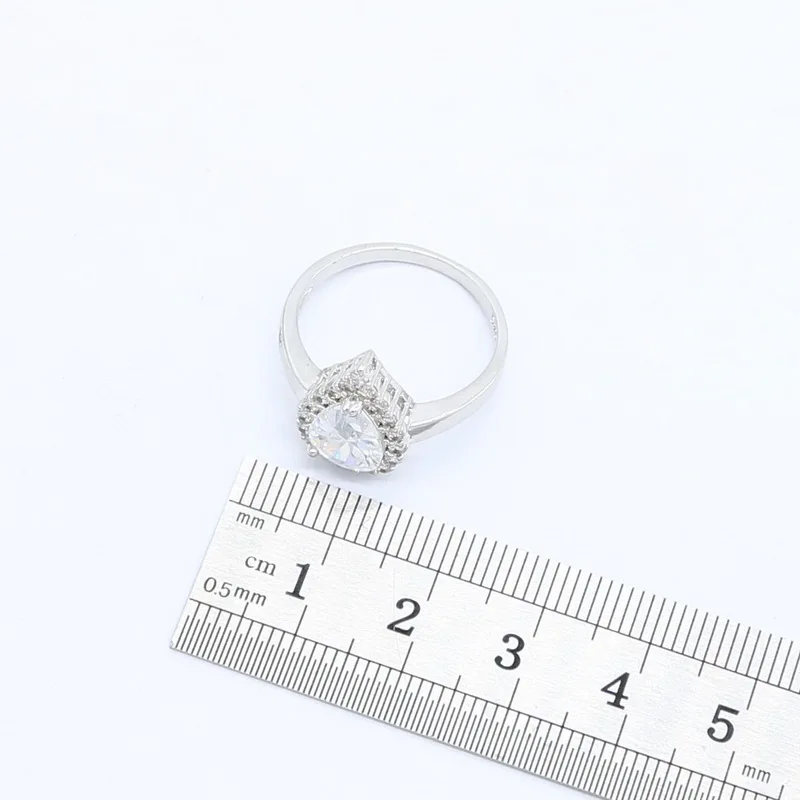 Комплект из кольца и сережек с цирконом серебристого цвета | Украшения