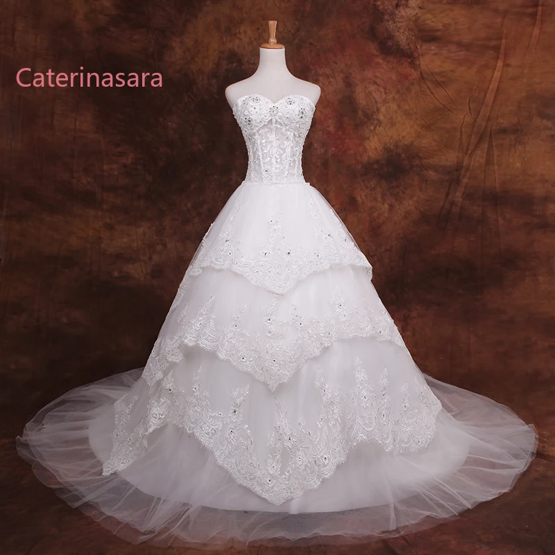 

Luxury Ball Gown Appliques Wedding Dresses Sweetheart Lace Tulle Bridal Gowns Sleeveless Lace-Up Court Train Long Wedding Gown