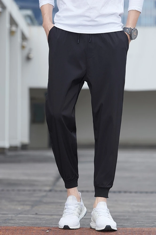 Брюки-шаровары женские с поясом на резинке черные/темно-серые камуфляжные |