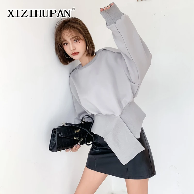 

Однотонная Асимметричная Женская толстовка XIZIHUPAN с разрезом, свободные женские свитшоты с круглым вырезом и длинным рукавом в стиле пэчвор...