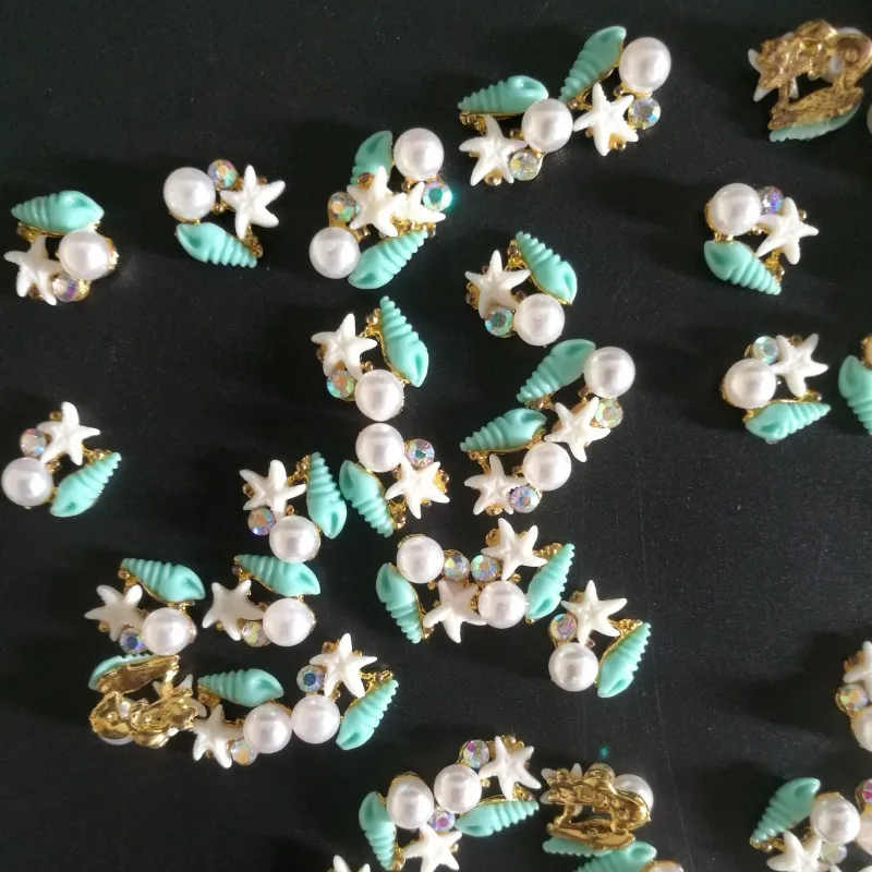 

Blue Starfish/Conch Rhinestones/Pearls 10Pcs/Lot Mini Nail Charms Gold Plated Alloy Nail Art Decorations 3D DIY Manicure 2711