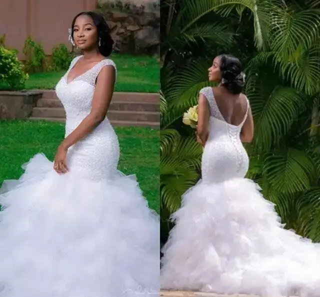 

African Mermaid Wedding Dresses 2022 Major Beading Cap Sleeves V Neck Bridal Gown Tiered Ruffles Skirt Vestidos De Novia