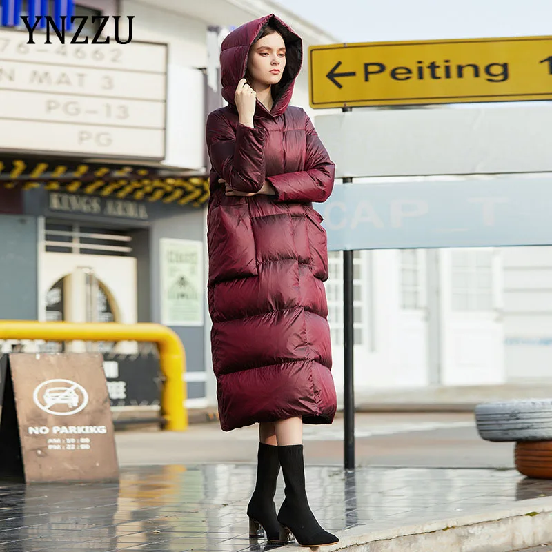 

Пуховик женский зимний длинный пуховик с капюшоном фиолетового цвета