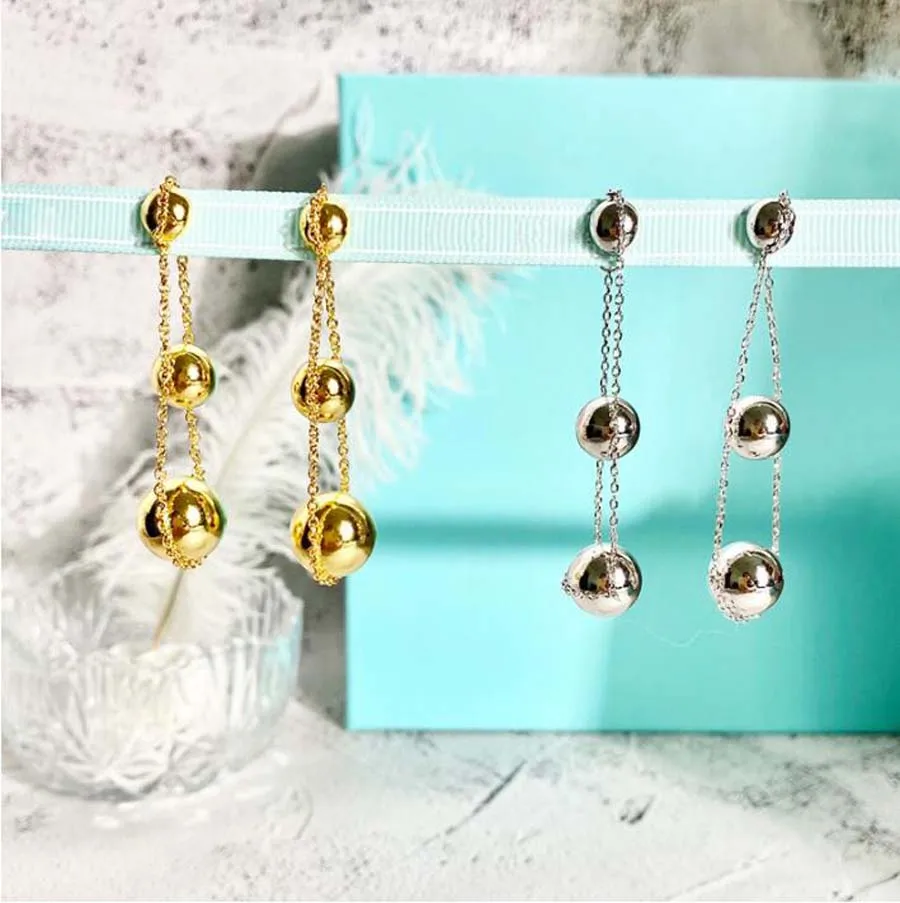 

Женские серьги-подвески с тремя шариками и кисточками, длинные, золотистые, металлические, круглые