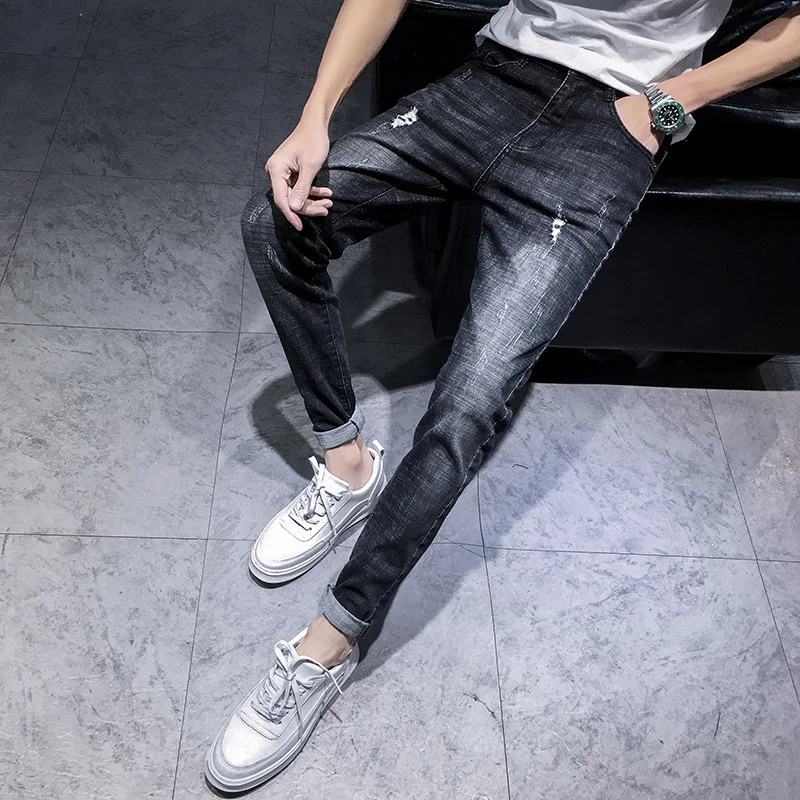 

Popular logo man hole in nine points feet stretch jeans joker trendy male beggar pants