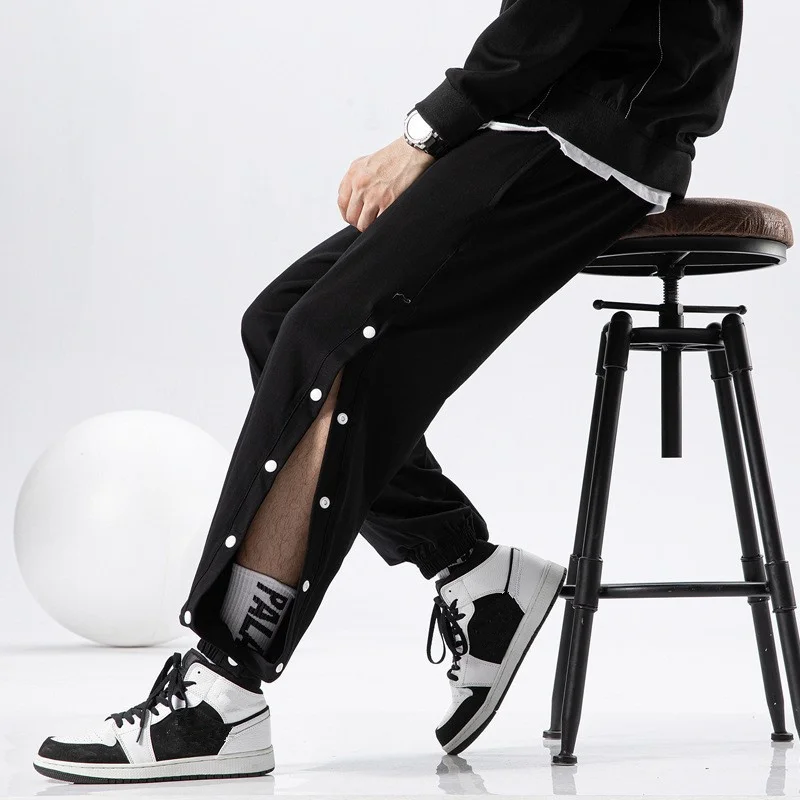 Pantalones deportivos de algodón con botones para hombre, pantalón de chándal holgado, informal, Hip Hop, color negro, novedad de verano, 2022
