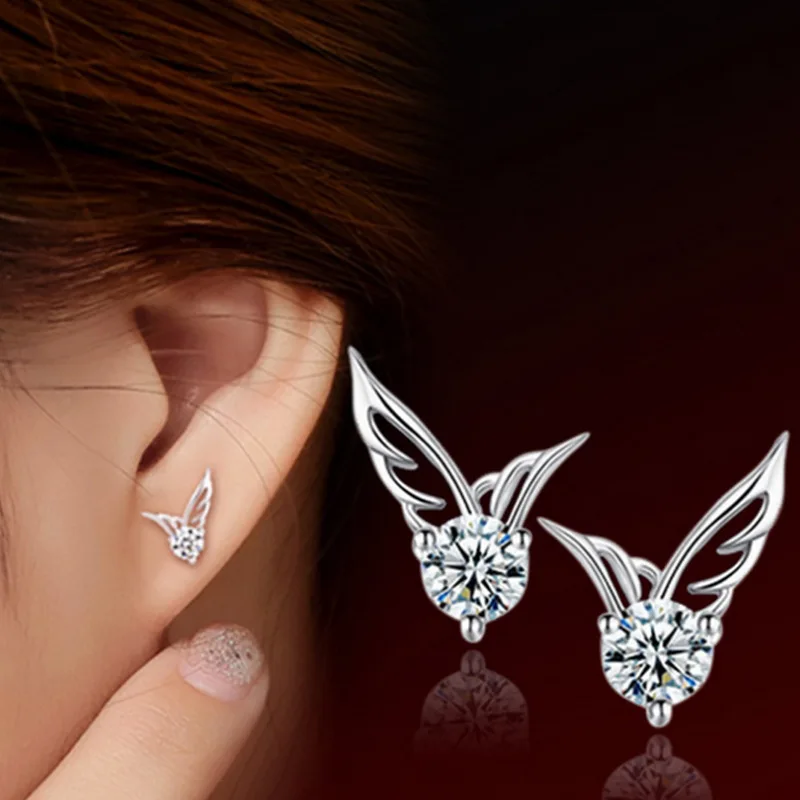 

Женские серьги с инкрустацией в виде крыльев Ангела