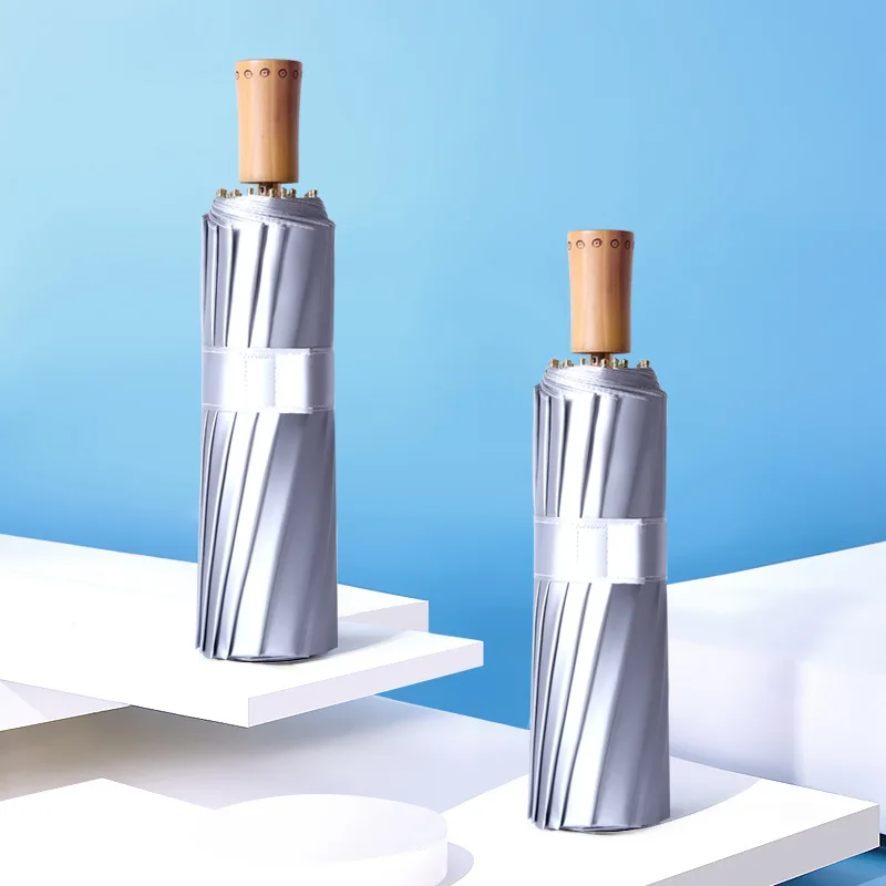 

The New Titanium Silver 16 Unit Folding Umbrellas Sun Umbrellas Dual-Use Rain Umbrella Shade UV Three-Fold Umbrella