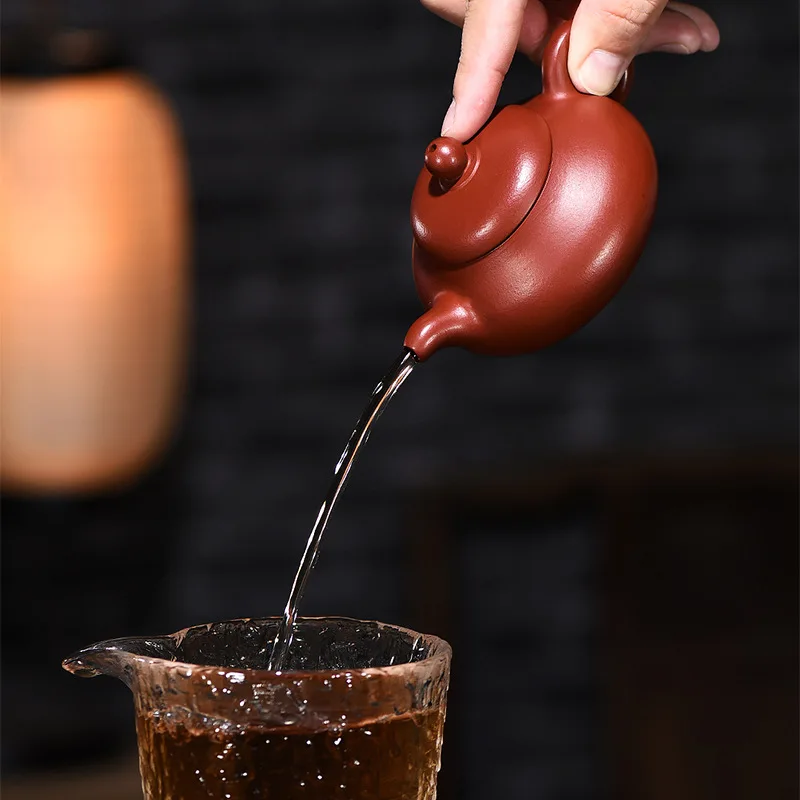 

Yixing raw ore purple clay pot handmade Dahongpao ball hole small jade milk