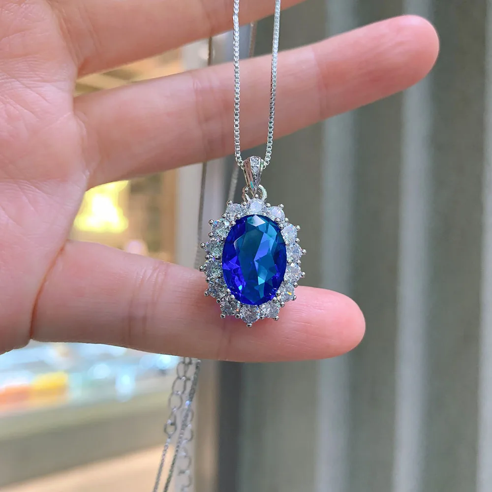 Комплект из кольца и серёг с танзанитом сапфиром